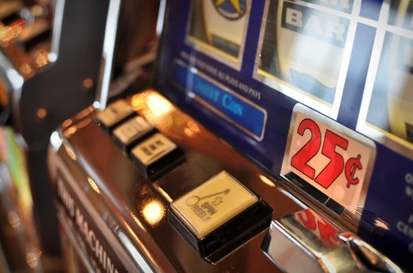 n77 slot app showing live baccarat and slot game interface