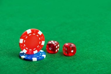Live baccarat dealer at table with multi-camera view on screen